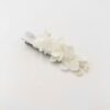 Petite barrette blanche en fleurs stabilisées pour la demoiselle d'honneur