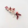 Petite barrette rose en fleurs stabilisées pour la demoiselle d'honneur